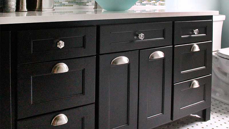 Custom black bathroom vanity with crystal hardware